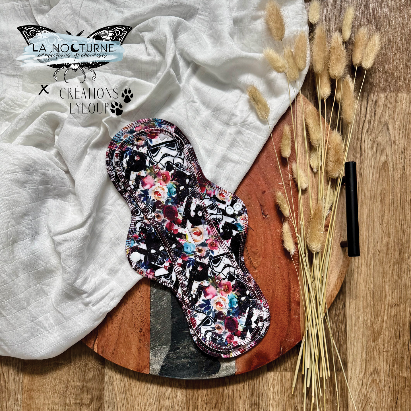 PRÊTE À PARTIR - Serviette hygiénique lavable Casques floraux (performance knit)